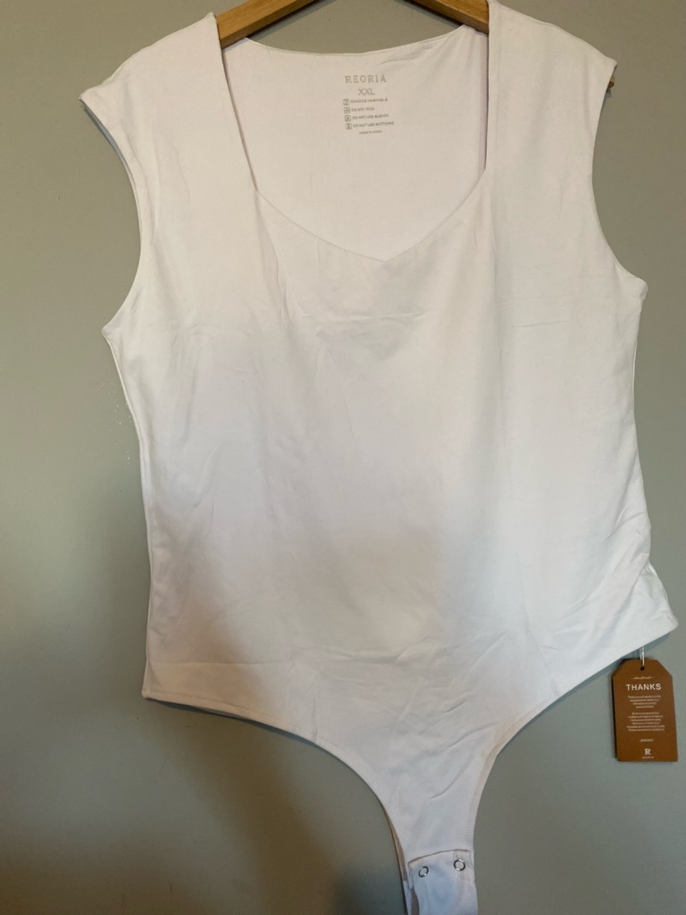ReoRia White Sleeveless  women’s Bodysuit
